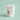 "Minimalist product shot of Flower Power dog treats with soft pastel background, emphasizing the natural and clean label ingredients."